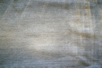 old and worn denim for textured background or wallpaper