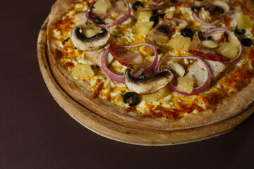 Pizza with pineapple and chicken