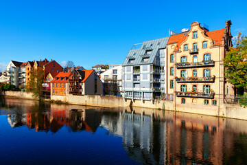 Residential houses situated on the river shore . Nuremberg residential district and Pegnitz river
