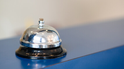 Hotel ring bell on counter desk at front reception 