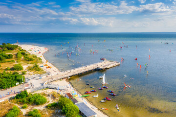 Pier in Jastarnia town on the Puck Bay at summer, Poland. - obrazy, fototapety, plakaty