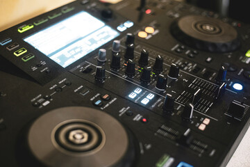 Fototapeta na wymiar control panel used by the DJ to mix live music