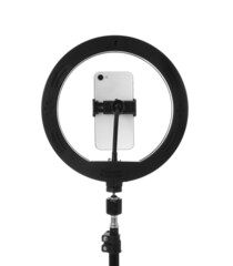 Tripod with ring light and smartphone isolated on white
