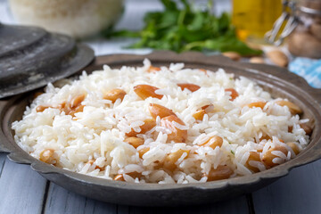 Traditional delicious Turkish food; Almond rice pilaf (Turkish name; Bademli pirinc pilavi)
