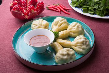 Georgian traditional food khinkali served n a restaurant