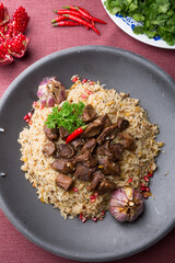 Traditional uzbek lamb pilaf food served for fiest