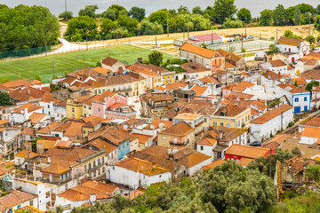 Fototapeta na wymiar The architecture of Santarem surrounded by green fields and Tagus river, Portugal