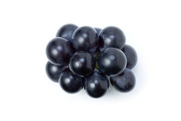 Black grapes fruit isolated on white background.