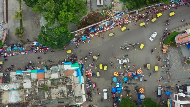 Top down approaching view of busy intersection in Bangalore India
