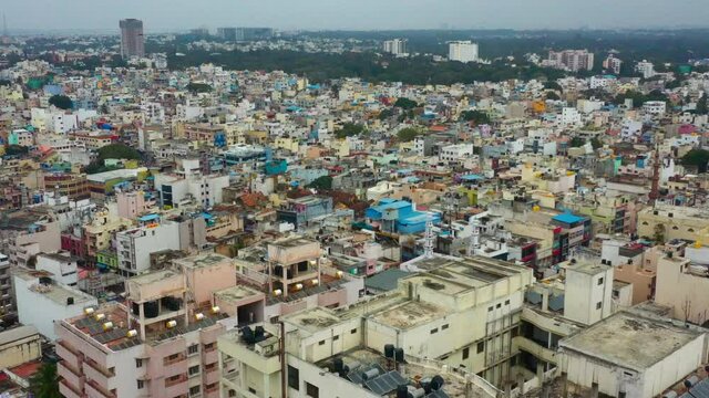 Aerial upwards rotating view of urban community in Bangalore India