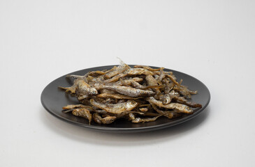 Fototapeta na wymiar salted fish on a ceramic plate