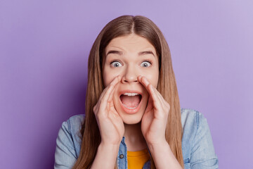 Close up photo of excited promoter girl hands open mouth scream on violet background