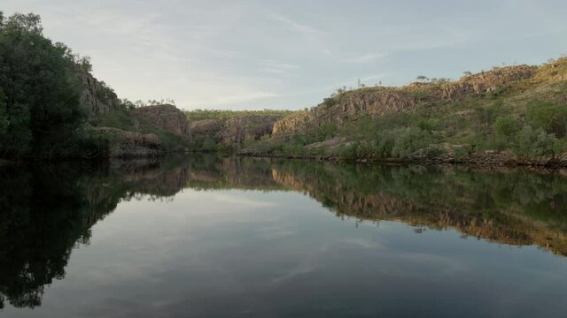 a wide view of nitmiluk gorge during a cruise at sunrise in nitmiluk national park of the northern territory