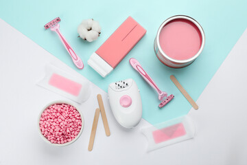 Set of epilation products on color background, flat lay