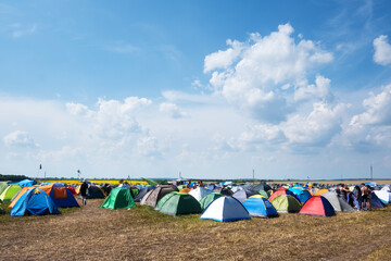 Tents on a music festival campsite - obrazy, fototapety, plakaty