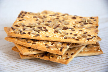 Close-up of cookies out of focus. Cookies with sunflower seeds in a heap.