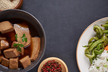 Healthy Organic Tofu and Rice Buddha Bowl with Veggies. Poke bowl with silken tofu, rice and mixed vegetables, carrots, asparagus, tomatoes, beans . Healthy vegetarian salad bowl.