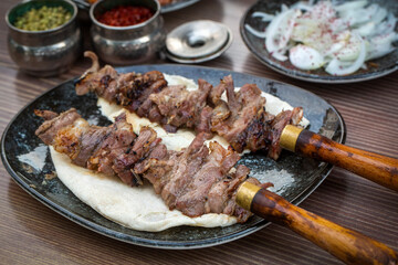 Traditional delicious Turkish food; Oltu cag kebabi, doner grilled kebab from Erzurum cuisine