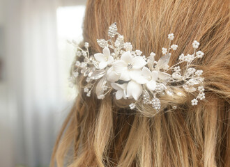 a detail of a bride's hairpin