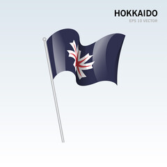 Waving flag of Hokkaido prefectures of Japan isolated on gray background