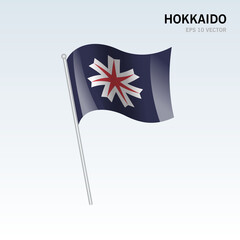 Waving flag of Hokkaido prefectures of Japan isolated on gray background
