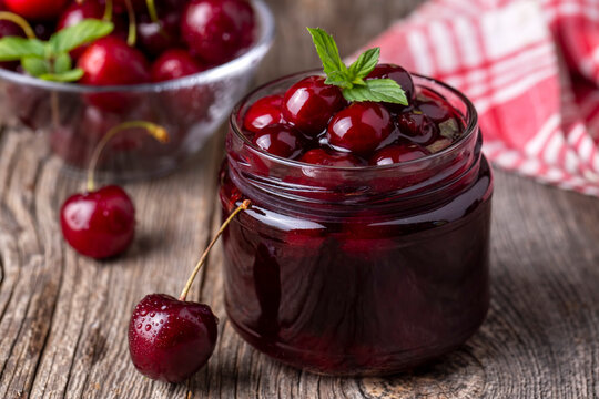 Jars with freshly homemade cherry jam