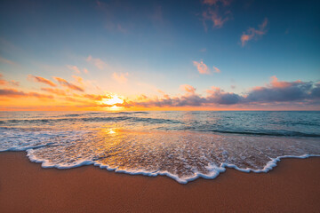 Beach sunrise over the tropical sea. Exotic island.