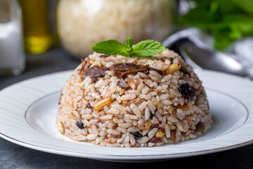 Traditional delicious Turkish food; rice pilaf with pine nuts and currants (Turkish name; ic pilav or pilaf)