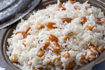 Traditional delicious Turkish food; Almond rice pilaf (Turkish name; Bademli pirinc pilavi)