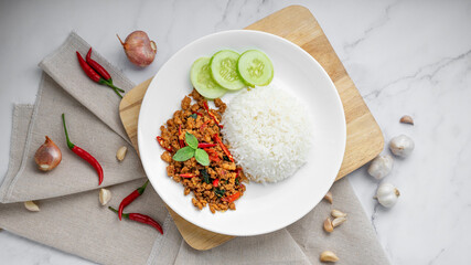 Thai food of spicy thai style fried basil on white table., Asian food style.