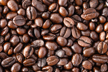 Close up horizontal of roasted coffee beans, concept coffee fresh from garden.
