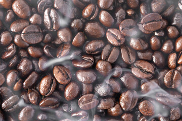 Close up horizontal of roasted coffee beans, concept coffee fresh from garden.
