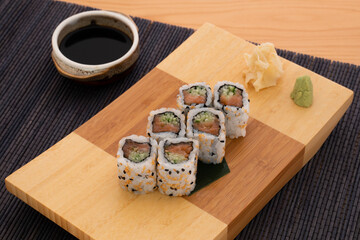 Salmon Roll with Soy Sauce, Pickled Sushi Ginger (Gari), wasabi. © Studio Roux