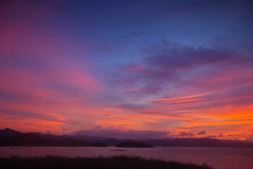 Colorful cloud ripple over a lake in an evening