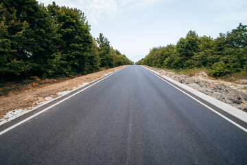 Fototapeta na wymiar White eye road marking on motorway