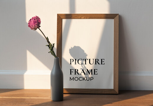 Dried Pink Peony Flower in a Gray Vase by a Frame Mockup