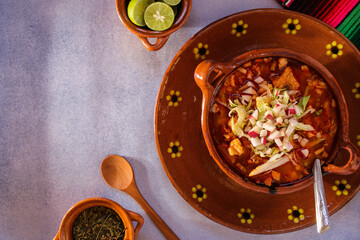 clay plate with pozole, traditional Mexican food