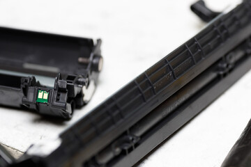 Disassembly of the toner cartridge for refilling. Restoration and maintenance in the service center...