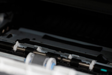 Internal parts of a laser printer. Maintenance and repair of office equipment.