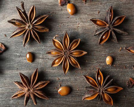 Anise stars on wooden table