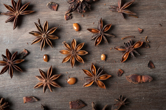 Anise stars on wooden table