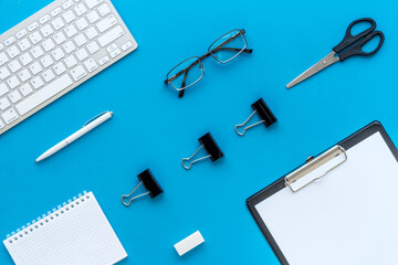 Office or home workspace with computer keyboard. Top view