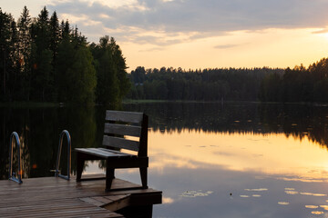 Fototapeta premium Sunset on pier in Finland during summer