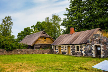 Fototapeta na wymiar Old wooden rustic house in a country side in Estonia.
