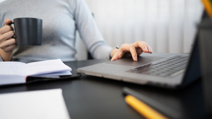 Young asian student watching lesson online and studying from home. online education concept