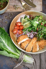 Delicious fresh salad with crispy grilled chicken breast