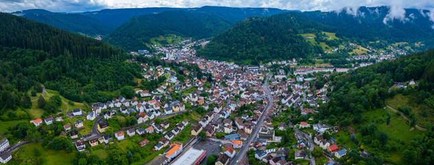 Aerial view around the city Schramberg in Germany. On a cloudy day in spring - obrazy, fototapety, plakaty