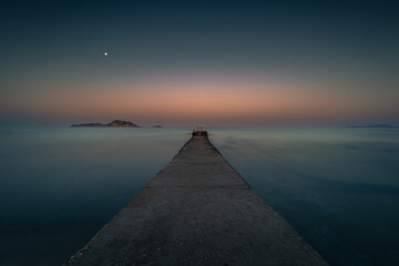 Beautiful sunrise over the Arillas beach. North Corfu. Greece