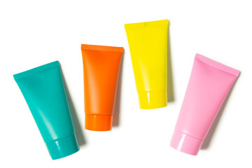 Creative beauty fashion concept photo of cosmetic recyclable bottle lotion cream on white background.