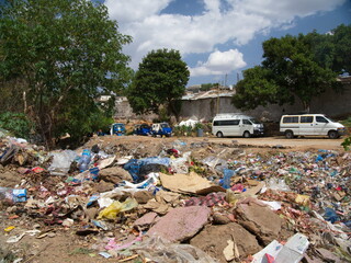 Waste dump of plastic bottles showing environmental destruction and need for recycling Ethiopia.